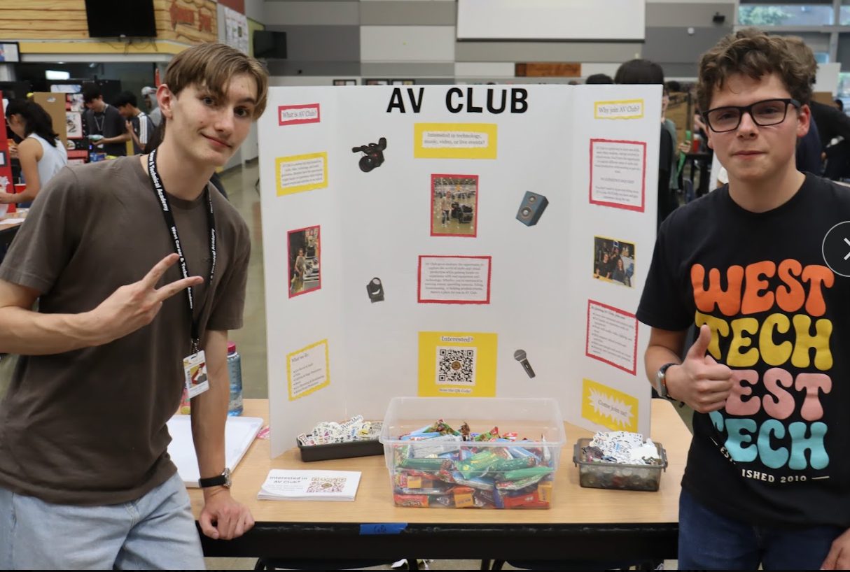 Two AV Club members running the club booth at Club Carnival